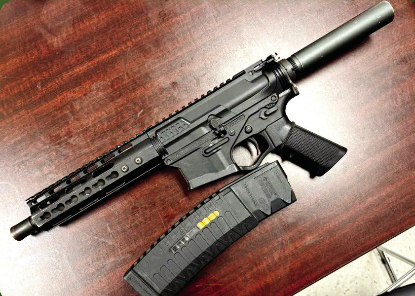 An American Tactical 5.56 pistol with over 40 rounds of ammunition was found on the rear seat of the Altima. CONTRIBUTED