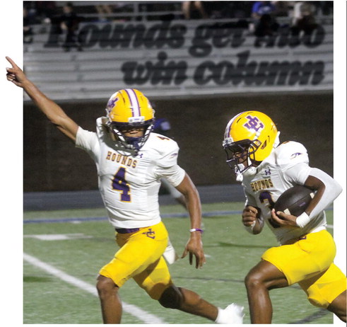 Kaden Canty (3) breaks away for a first-quarter touchdown as Travis Miller celebrates in stride during Friday’s win at Burke County. SEE FULL COVERAGE >> PAGE B1 BRAD HARRISON/Staff