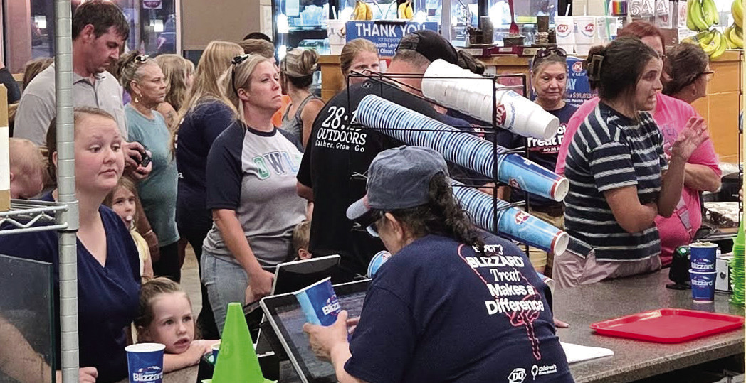 Crowds filled Gray’s Dairy Queen all day July 30 to support the Miracle Treat Day effort, working together to raise what turned out to be a quarter of a million dollars for the Beverly Olson Children’s Hospital in Macon. BRANDY ROUND/Staff