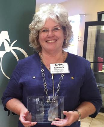 Cogburn with Georgia Organization of Nurse Leaders award in 2016. CONTRIBUTED
