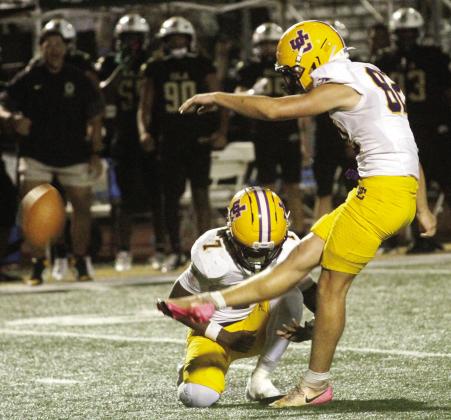 Greyhound placekicker Jacob Watts connects for a 38-yard field goal to clinch the overtime win. BRAD HARRISON/Staff