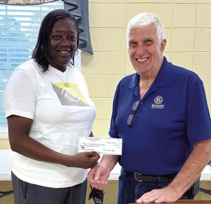 Kiwanis President, Joe Briley Jr. presented a donation of $750 from the Jones County Kiwanis Club to Pam Peek, CEO of the Boys &amp; Girls Club of Jones County. Peek is also CEO of the Baldwin County Boys &amp; Girls Club. She made an inspirational talk on the work of the organization and presented an informative slide show of its activities this past year. CONTRIBUTED