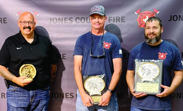 Chief of Operations Greg Beni (l-r) received a 5-year service award, Tim Daniel a 15-year award, and Stephen Holloway for 20 years. William Swift (not pictured) was given a 25-year service award .
