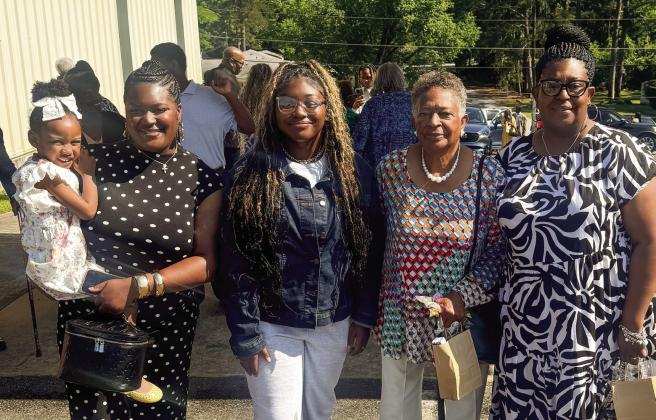 Evelyn Hill’s granddaughter Erica (l-r) with Skylar, Asha (Alethea’s goddaughter), Evelyn and Alethea Shun. CONTRIBUTED
