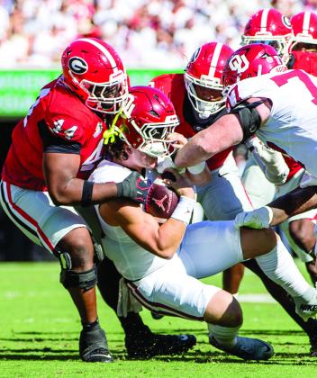 Georgia’s swarming defense made life difficult for Oklahoma quarterback John Mateer. SKYLA MORRIS/Staff