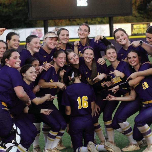 SWEET VICTORY: The Lady Greyhounds pose with jubilation after Thursday’s 5-2 win against Madison County to advance past the opening round of the state tournament. SEE FULL COVERAGE IN SPORTS >> PAGE B1 BRAD HARRISON/Staff