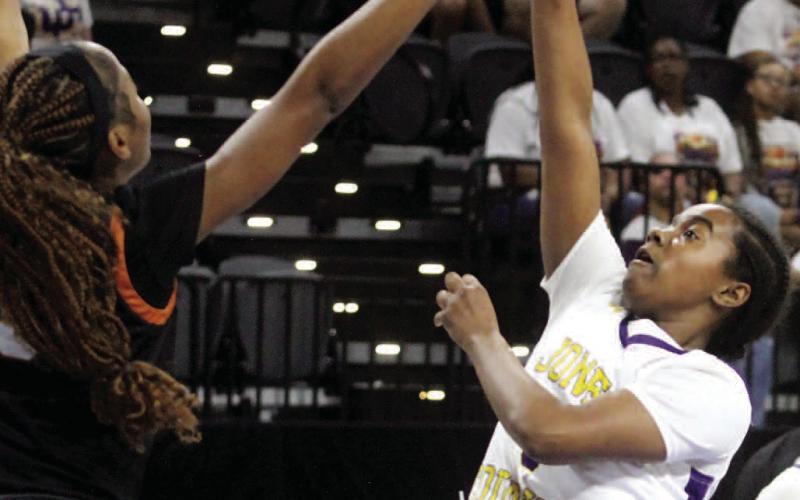 Autumn Coleman lays the ball up for two points in the first half. BRAD HARRISON/Staff