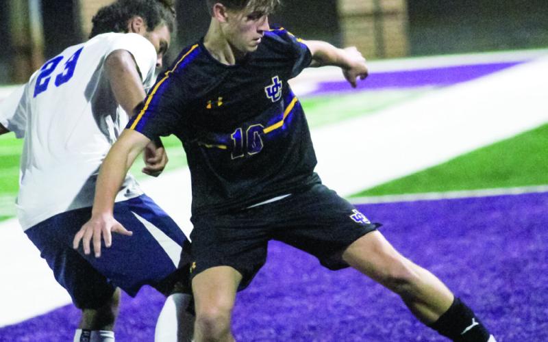 Jacob Watts battles for the ball against Northside. BRAD HARRISON/Staff