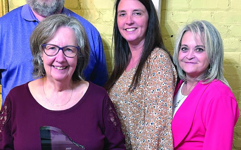 Award winner Debbie Lurie-Smith (front) with (l-r) Josh Lurie, Jennifer Gibson and Sharon Ruff. CONTRIBUTED