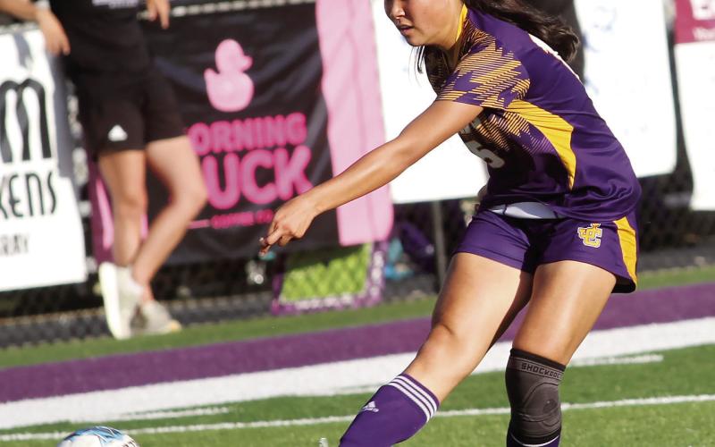 Emma Gordon powers the ball toward the Royals net during Thursday’s win. BRAD HARRISON/Staff
