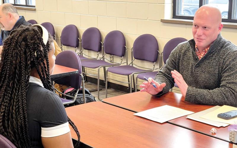 Bryan Hutchinson of First Environmental interviews a student at Jones County High School. CONTRIBUTED