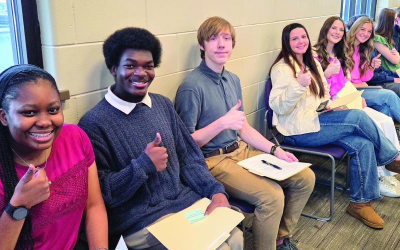 Jones County High School Students give a thumbs up while waiting their turns for the mock interviews with local employers, designed to them hands-on experience for future interviews. CONTRIBUTED