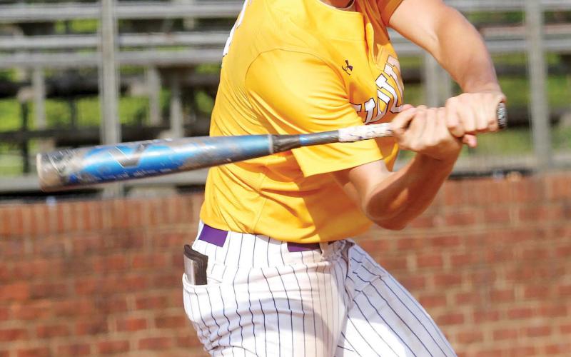 Jonathan Scarbary lines a Glynn Academy pitch toward the outfield against the Red Terrors. BRAD HARRISON/Staff