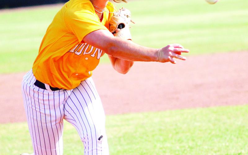Trent Paulk delivers a pitch during the fourth inning on Friday. BRAD HARRISON/Staff