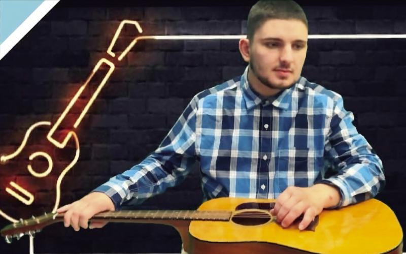 Kameron Kimsey with performs with his acoustic at a recent event. Despite a diagnosis of autism and blindness at an early age, he continues to use his talents to give back to others. CONTRIBUTED