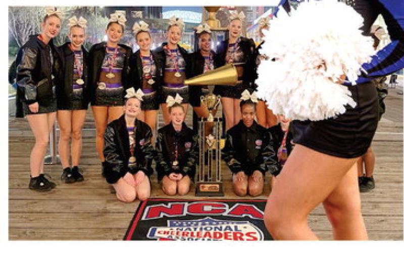 Normandy Furness, who is part of the competition cheer squad at Gray Station Middle School, recently helped those around her win in another arena of competition. An eighth-grader at GSMS, Furness was part of an allstar cheer squad, MGA out of Byron, that recently won a national title. CONTRIBUTED
