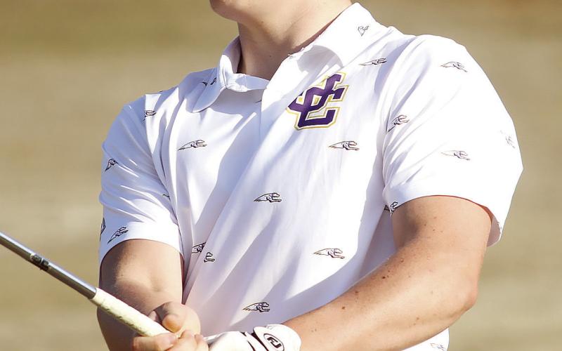 Ethan Lewis follows through after blasting off a tee shot. BRAD HARRISON/Staff