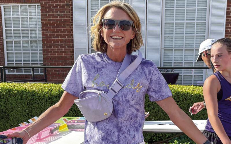 Graves traded in her signature spike heels for running shoes to show her support for the Col. Allen Carr 5K sponsored by the JCHS ROTC. DEBBIE LURIE-SMITH/Staff