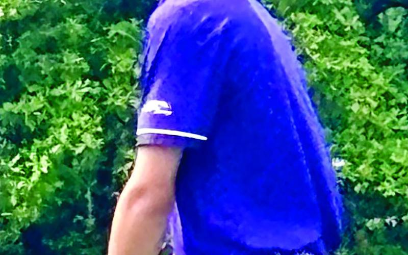 Dixon Dowling lines up his putt during last week’s two-round event. CONTRIBUTED
