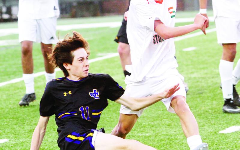 Will Utley battles for the ball against Stockbridge. BRAD HARRISON/Staff
