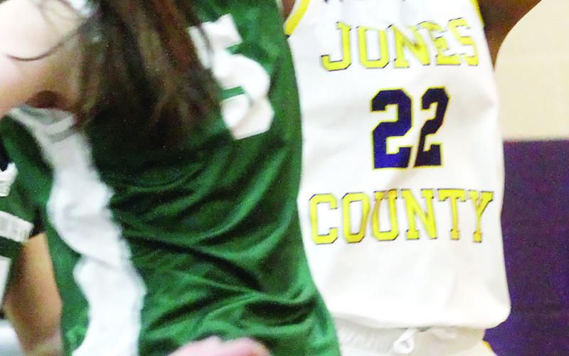 Kamiyah Adams elevates to convert a jump shot during Tuesday’s first-round win against Westminster. BRAD HARRISON/Staff