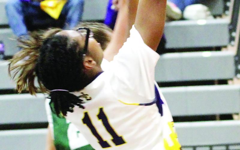 Autumn Coleman lays the ball up for two points. BRAD HARRISON/Staff