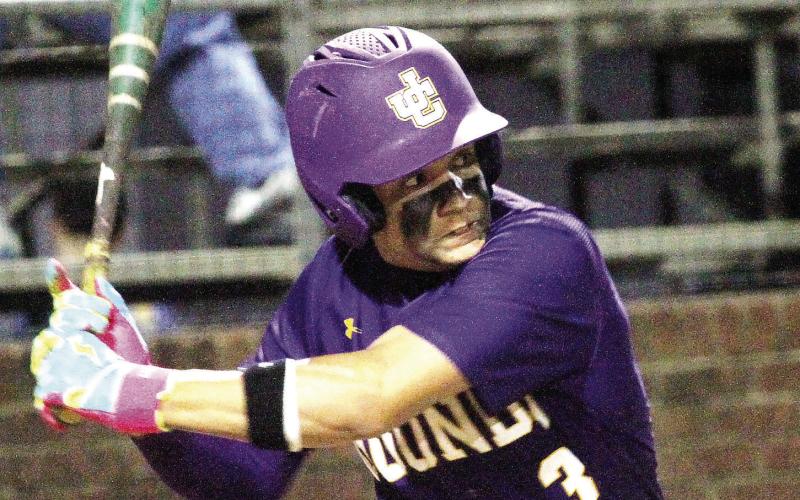 MJ Lane eyes the pitch from the mound during the win against Woodland. BRAD HARRISON/Staff