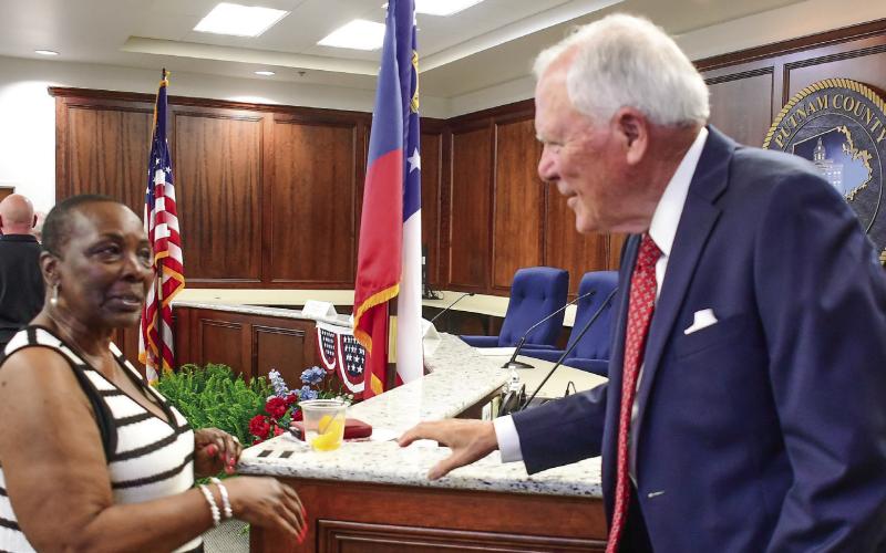 Eatonton First Lady Janie Reid, wife of Mayor John Reid, shared a moment with former Georgia Governor Nathan Deal at the conclusion of Saturday night’s “Voices and Votes” discussion in the meeting room of the Putnam County Annex.