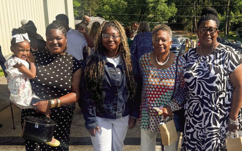 Evelyn Hill’s granddaughter Erica (l-r) with Skylar, Asha (Alethea’s goddaughter), Evelyn and Alethea Shun. CONTRIBUTED
