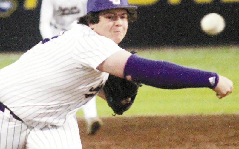 Cayden Tidwell hurls a pitch toward home plate. BRAD HARRISON/Staff
