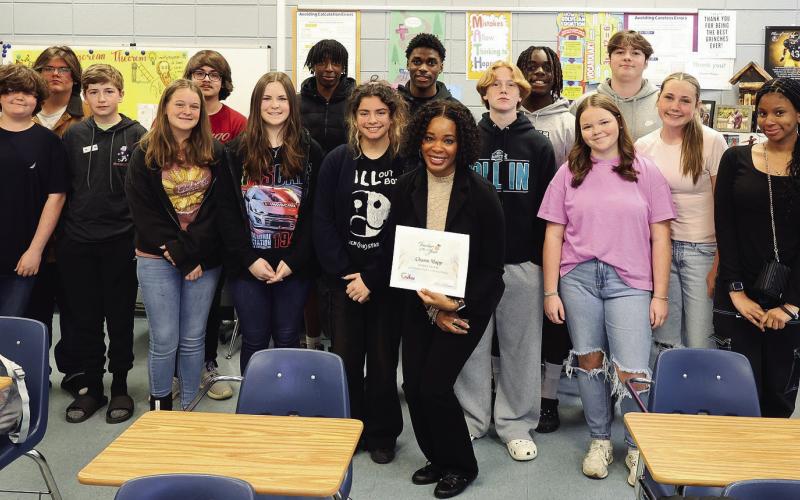 JCSS 2025 Teacher of the Year Charm Mapp and her CRMS class after finding out she is a finalist for the state title. CONTRIBUTED