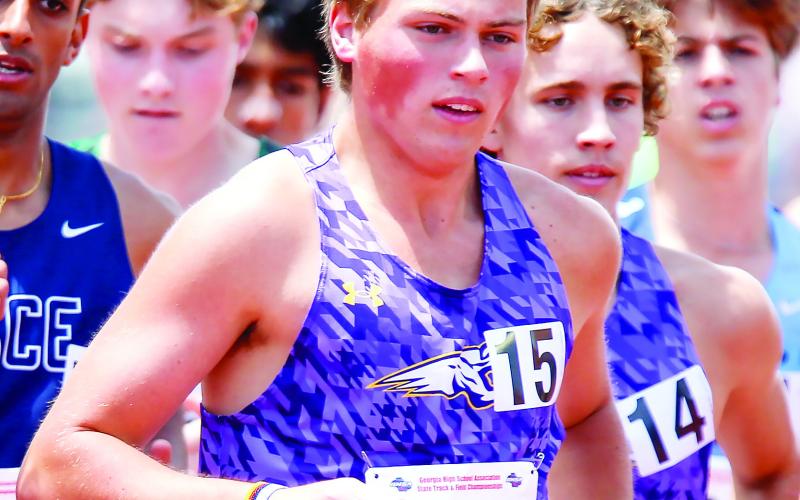 Gavin Robinson was part of the Greyhounds’ 4x800 relay team that set a county record with Monday’s third-place finish. LANCE McCURLEY/Staff