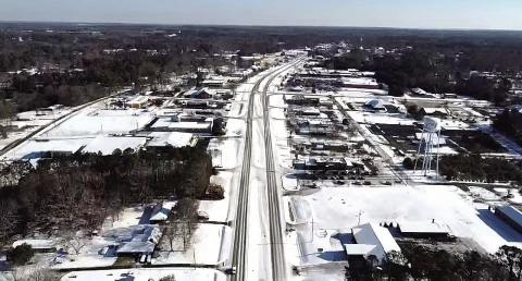 A rare snow event blanketed Gray and Jones County with up to four inches of snow last week, which can be seen above along West Clinton Street. SEE MORE PHOTOS SUBMITTED BY READERS >> PAGE C5 MATTHEW PITTMAN/Contributed via Facebook