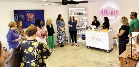Those who attended the Georgia Downtown Association meeting in Gray enjoyed with a walking tour of downtown businesses, including a visit to Allure Aesthetics. CONTRIBUTED