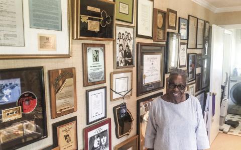 Zelma Redding with just a bit of the memorabilia in what was the garage of the Jones County home. GREENBERRY MOORE/Staff