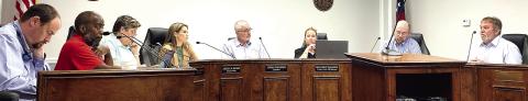 Jones County commissioners discuss their differing views about requesting a state audit of the county’s property digest and values at the April 16 meeting. DEBBIE LURIE-SMITH/Staff