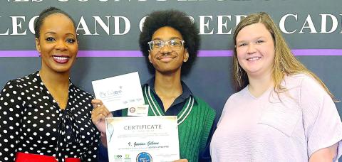 Javian Gibson (center) with his notice of selection for a place on the Georgia Department of Education Advisory Council. CONTRIBUTED