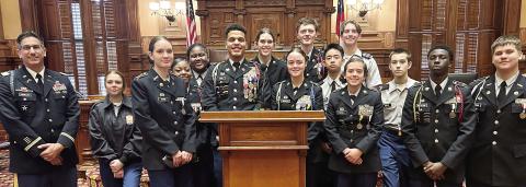 Jones County High School JROTC Greyhound Battalion cadets gathered around the speaker’s podium to document their day at the Capitol March 6. BRANDY ROUND/Contributed