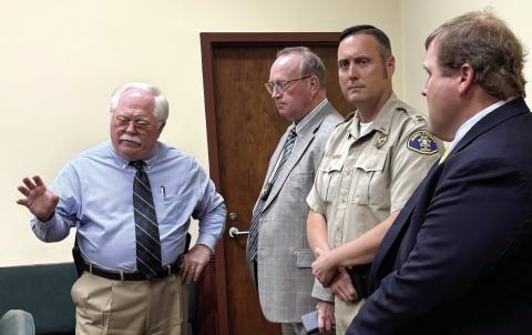Putnam County Sheriff Howard Sills (l-r) Jones County Sheriff’s Office Chief Deputy Earl Humphries, Capt. Travis Douglas and Investigator John Simmons at May 16 press conference. DEBBIE LURIE-SMITH/Staff