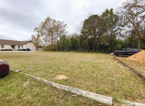 The empty lot of Madison Street, currently only used for parking, is being proposed as the future site of an acoustic venue to showcase local talent. DEBBIE LURIE-SMITH/Staff