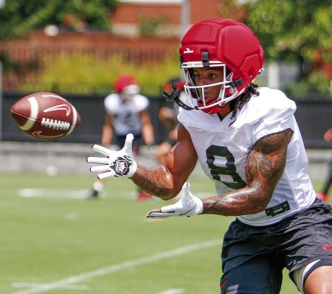 Georgia veteran defensive back Joenel Aguero attempts to catch a pass while participating in position drills during a practice on Thursday, July 31. LANCE McCURLEY/Staff