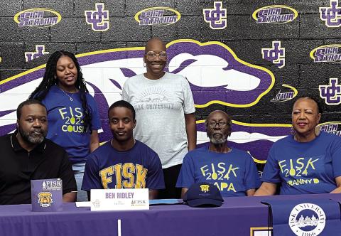 Ben Ridley poses after signing on to play for Fisk University last week. CONTRIBUTED