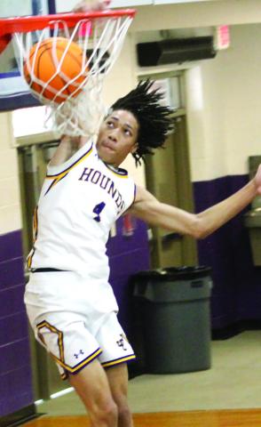Justin Ray finishes off a dunk in the second half against Kendrick. BRAD HARRISON/Staff