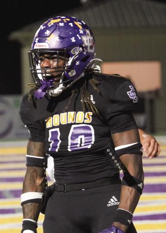 BRAD HARRISON/Staff DJ Ingram celebrates after getting into the end zone for a firsthalf touchdown during Friday’s win.