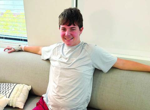 Following the accident that left him paralyzed, Gabe Eisner is facing an uncertain future, but that does not keep him from smiling. CONTRIBUTED
