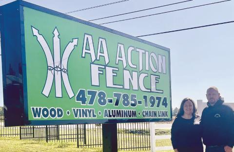 Chad and Kim Kohlmayer, the owners of AA Action Fence Company, outside of their business. ALAINA CLARKE/Staff