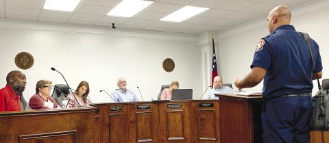 Jason Moss appeals to Jones County Commissioners last week about his three dogs that were previously deemed as dangerous. DEBBIE LURIE-SMITH/Staff