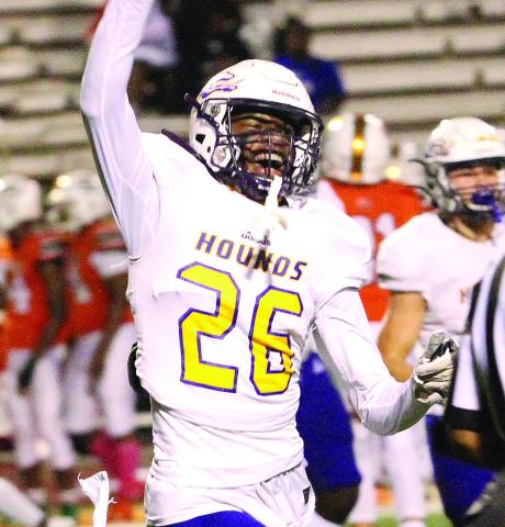 Javion Clark celebrates the Greyhounds coming up with a turnover early in the 2020 game against Stockbridge. BRAD HARRISON/File photo