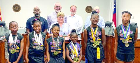 Members of the Jones County’s Track and Field Team that includes state championship winners were celebrated at the May 21 Board of Commissioners meeting. DEBBIE LURIE-SMITH/Staff