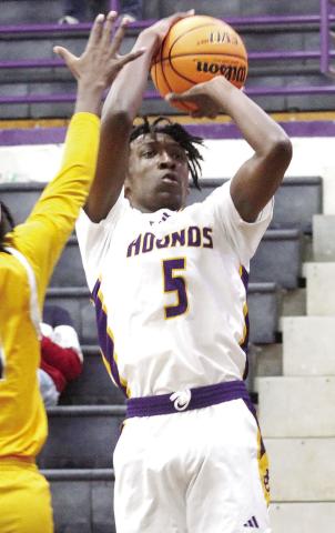 Jayden Tolbert goes up to get off a jump shot against the Chargers. BRAD HARRISON/Staff